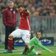 Bayern Munich's midfielder Joshua Kimmich (L) and Eindhoven's midfielder Andres Guardado (R) vie for the ball during the UEFA Champions League group D football match FC Bayern Munich vs PSV Eindhoven in Munich, on October 19, 2016
