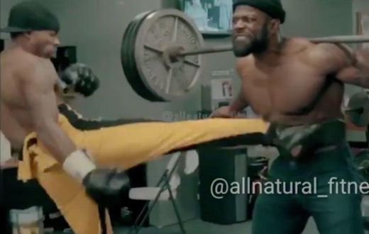 Man squats 405 pounds.