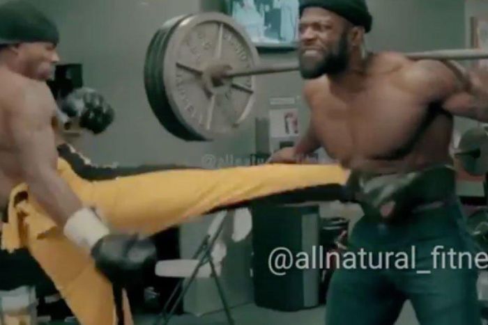 Man squats 405 pounds.