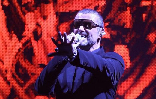 Late British singer George Michael performs on stage in the French city of Nice in September 2011