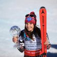 Tina Weirather of Liechtenstein smiles with the globe for winning the overall title for the ladies' Super-G following the ladies' Super-G during the Audi FIS Ski World Cup Finals at Aspen Mountain on March 16, 2017 in Aspen, Colorado