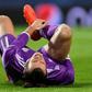 Real Madrid's Welsh forward Gareth Bale grimaces as he lies on the pitch during the UEFA Champions League football match Sporting CP vs Real Madrid CF at the Jose Alvalade stadium in Lisbon on November 22, 2016