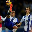 Porto's Uruguayan defender Maxi Pereira(L) in action against SC Braga: his team are chasing a Champions League spot