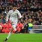 Real Madrid's forward Cristiano Ronaldo scores during the Spanish league football match against Atletico Madrid November 19, 2016