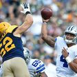 Clay Matthews of the Green Bay Packers attempts to block a pass attempt from Dak Prescott of the Dallas Cowboys during the second quarter at Lambeau Field on October 16, 2016 in Wisconsin