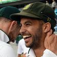 South Africa's captain Faf du Plessis (R) hugs teammate Jean-Paul Duminy as the team celebrates victory against Australia on November 15, 2016