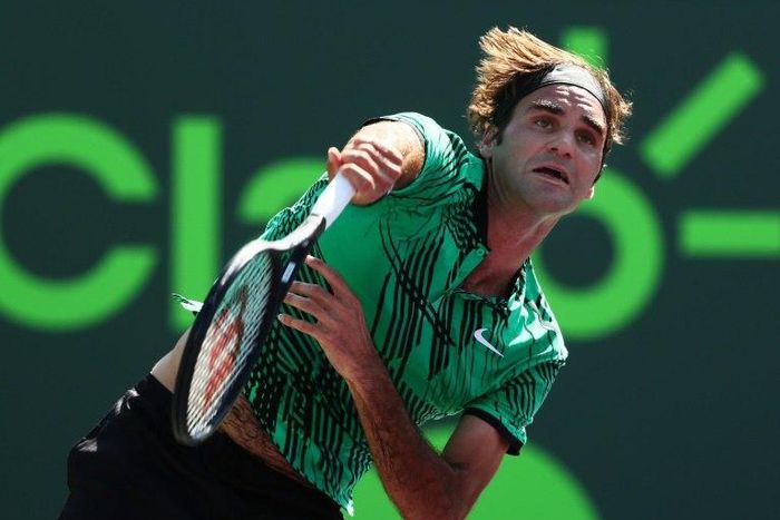 Roger Federer of Switzerland servest against Juan Martin Del Potro of Argentina during their Miami Open 3rd round match, at Crandon Park Tennis Center in Key Biscayne, Florida, on March 27, 2017