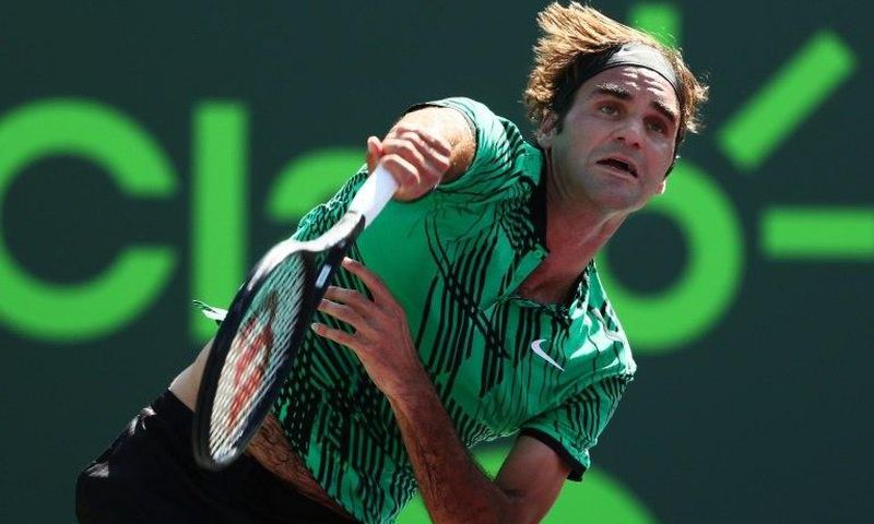 Roger Federer of Switzerland servest against Juan Martin Del Potro of Argentina during their Miami Open 3rd round match, at Crandon Park Tennis Center in Key Biscayne, Florida, on March 27, 2017