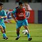 Clubs in China's top-tier Super League have over the past year shelled out increasingly extravagant amounts to import foreign stars such as Brazil's Oscar (L) and Hulk