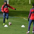 England's Daniel Sturridge (L) and Raheem Sterling attend a team training session ahead of their group F World Cup qualifying match against Scotland