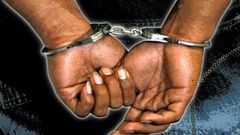 ___6211880___https:______static.pulse.com.gh___webservice___escenic___binary___6211880___2017___2___13___1___black-man-handcuffs--2-