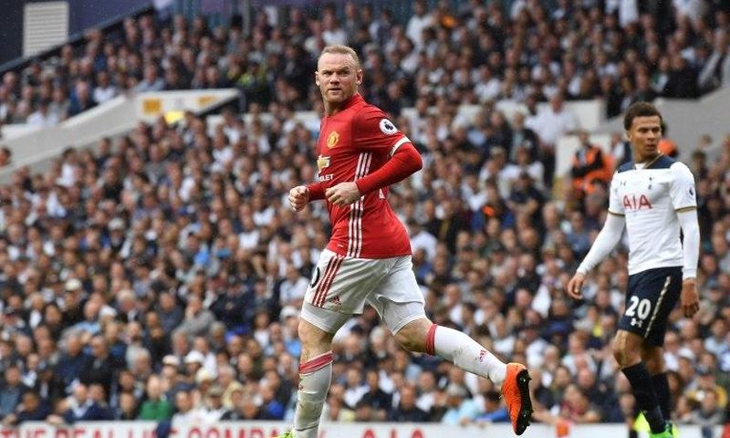 Manchester United striker Wayne Rooney runs back after scoring a goal during the English Premier League match against Tottenham Hotspur at White Hart Lane in London, on May 14, 2017