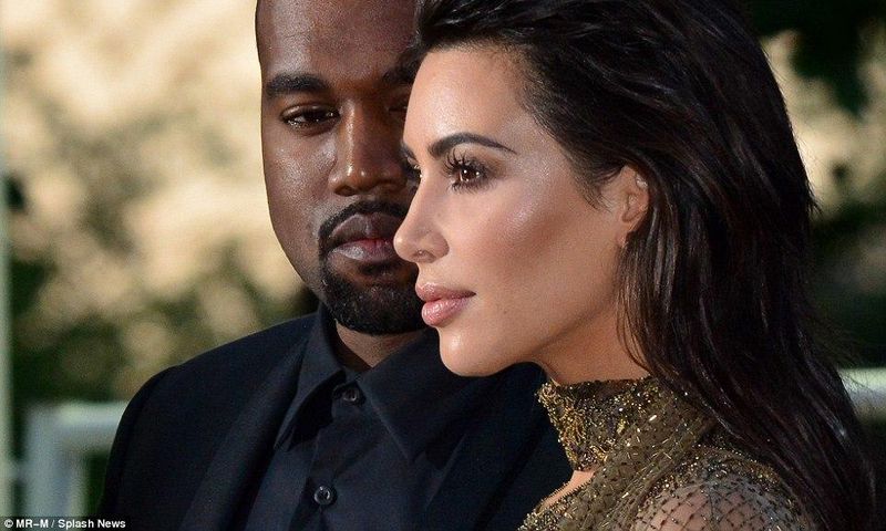 Kanye West and wife Kim Kardashian were all aglow for the Vogue 100 Festival in London.