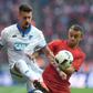 Hoffenheim's defender Ermin Bicakcic (L) and Bayern Munich's defender Rafinha clash for the ball on November 5, 2016