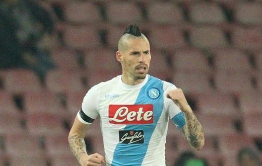 Napoli's midfielder from Slovakia Marek Hamsik celebrates scoring against Inter Milan on December 2, 2016