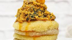 Eba topped with egusi soup