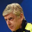 Arsenal London's French headcoach Arsene Wenger follows the press conference at the stadium in Munich, southern Germany, on February 14, 2017, on the eve of the UEFA Champions League round of sixteen match between FC Bayern Munich and Arsenal London