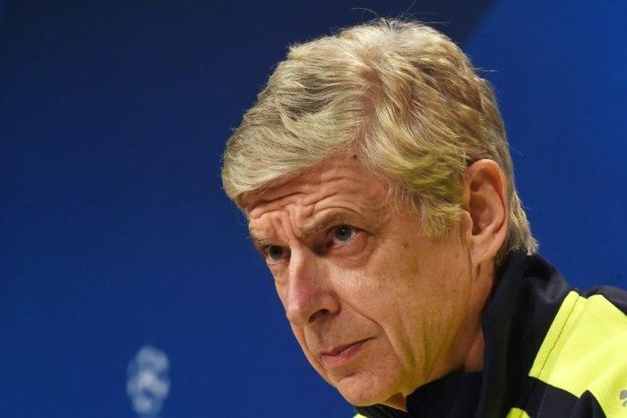 Arsenal London's French headcoach Arsene Wenger follows the press conference at the stadium in Munich, southern Germany, on February 14, 2017, on the eve of the UEFA Champions League round of sixteen match between FC Bayern Munich and Arsenal London