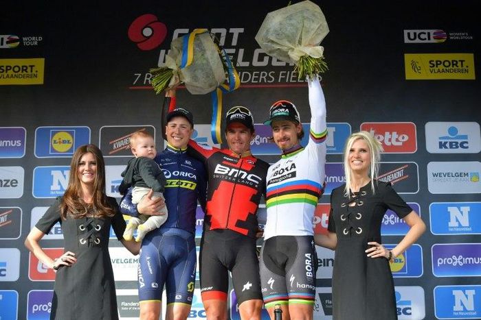 L-R: Belgian Jens Keukeleire of Orica Scott, Belgian Greg Van Avermaet of BMC Racing Team and Slovakian Peter Sagan of Bora-Hansgrohe celebrate on the podium on March 26, 2017 in Wevelgem after the Gent-Wevelgem one day cycling race