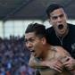 Liverpool's Brazilian midfielder Roberto Firmino (L) celebrates scoring his team's second goal with teammate Coutinho during their match against Stoke City in Stoke-on-Trent, central England on April 8, 2017