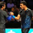 Indian player Leander Paes (L) and his then doubles partner Mahesh Bhupathi celebrate in happier times after a win at the ATP World Tour Finals tennis tournament in London on November 23, 2011
