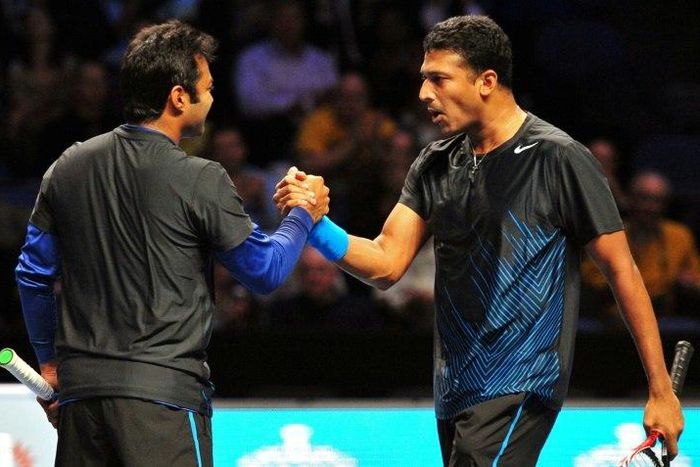 Indian player Leander Paes (L) and his then doubles partner Mahesh Bhupathi celebrate in happier times after a win at the ATP World Tour Finals tennis tournament in London on November 23, 2011