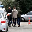 Players of the FC Grenoble rugby team arrive on March 22, 2017 at the police station in Grenoble to be heard as part of an investigation for rape
