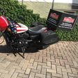 Custom-designed Harley Davidson pizza delivery motorcycles arrive in Ghana