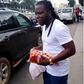 Edem selling A1 Bread on the street