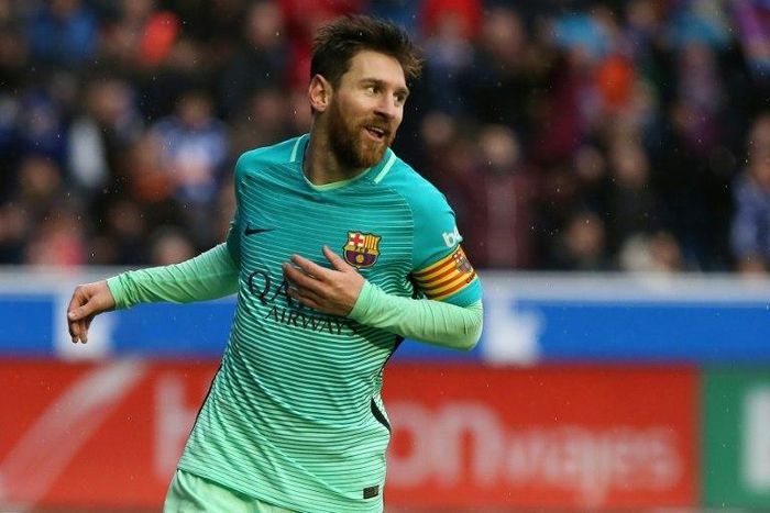 Barcelona's Argentinian forward Lionel Messi celebrates after scoring against Deportivo Alaves von Feburary 11, 2017