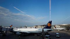 Aircrafts of German carrier Lufthansa are seen through the windows of gate B at Fraport airport in Frankfurt, Germany, May 28, 2016.   REUTERS/Kai Pfaffenbach