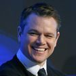 US actor Matt Damon smiles as he takes part in a meeting on the opening day of the World Economic Forum, on January 17, 2017 in Davos