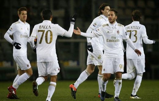 AC Milan players celebrate after scoring a goal during the match against Torino on January 16, 2017 at the Grande Torino Stadium in Turin
