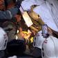 A baby was among five people rescued from the rubble