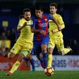 Villarreal's defender Mario (L) clashes with Barcelona's forward Luis Suarez on January 8, 2017
