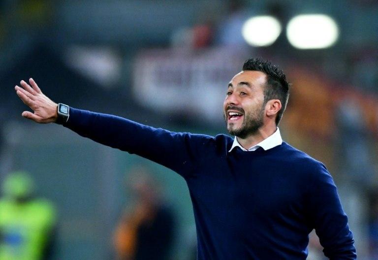 Palermo's Italian coach Roberto De Zerbi gestures during the Serie A match between AS Roma and Palermo at the Olympic stadium in Rome on October 23, 2016