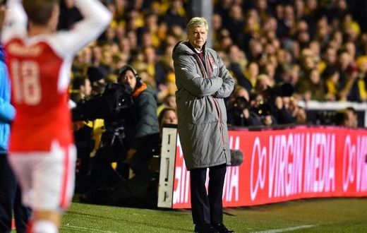Arsenal's manager Arsene Wenger watches from the touchline on February 20, 2017