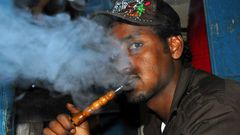 Man smoking shisha