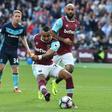 West Ham United's midfielder Dimitri Payet (L) scores against Middlesbrough at The London Stadium, in east London on October 1, 2016