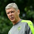 Arsenal's French manager Arsene Wenger arrives for a training session at Arsenal's London Colney training ground