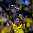 Dortmund's Pierre-Emerick Aubameyang lifts the trophy as the Bundesliga's top-scorer after the German first division football match against Werder Bremen on May 20, 2017
