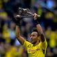 Dortmund's Pierre-Emerick Aubameyang lifts the trophy as the Bundesliga's top-scorer after the German first division football match against Werder Bremen on May 20, 2017