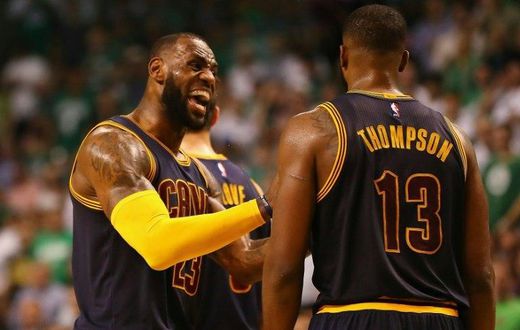 LeBron James reacts with Tristan Thompson of the Cleveland Cavaliers during Game One of their playoffs series against the Boston Celtics at the 2017 NBA Eastern Conference Finals on May 17, 2017 in Boston