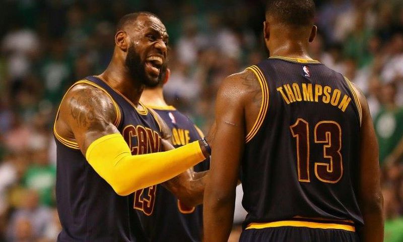 LeBron James reacts with Tristan Thompson of the Cleveland Cavaliers during Game One of their playoffs series against the Boston Celtics at the 2017 NBA Eastern Conference Finals on May 17, 2017 in Boston