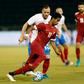 Qatar's striker Akram Afif is marked by Russia's defender Fedor Koudryashov (L) during the International friendly match between Qatar and Russia at the Jassim Bin Hamad Stadium in Doha on November 10, 2016