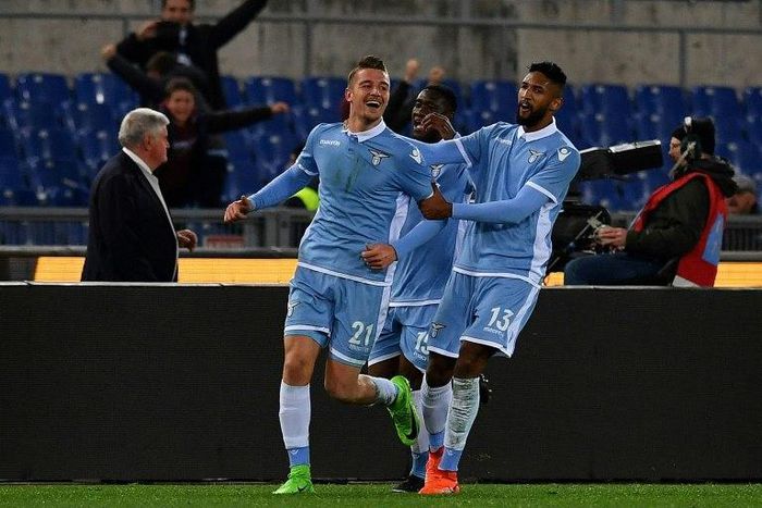 Lazio's midfielder Sergej Milinkovic-Savic (L) scored once in both legs of the Italian Cup semi-final