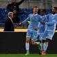Lazio's midfielder Sergej Milinkovic-Savic (L) scored once in both legs of the Italian Cup semi-final