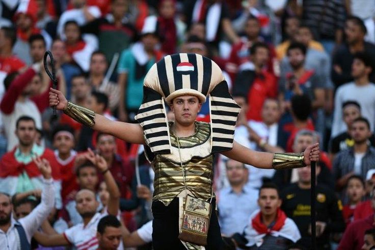 Egyptian fans cheer at the Borg el-Arab Stadium near Alexandria, on November 13, 2016