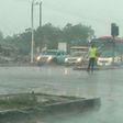 A Ghana police officer from Madina in Accra has won the praise of Ghanaians online, after he was photographed directing traffic in the heavy rain.