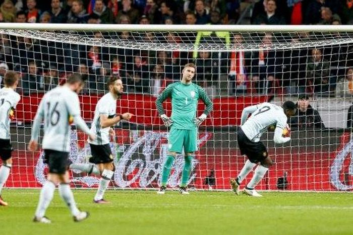 Belgium's players celebrate the equalizing goal of midfielder Yannick Carrasco (C) during an international friendly soccer match between The Netherlands and Belgium on November 9, 2016